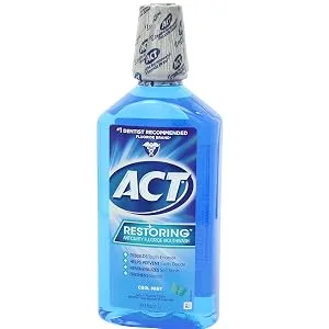 ACT Restoring Fluoride Mouthwash 33.8 fl. oz. Strengthens Tooth Enamel  Cool Mint Cool Splash Mint 33.8 Ounce (Pack of 1) - product information 1