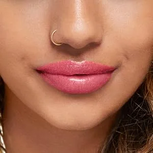 Rimmel Stay Glossy Lipgloss  Claridge's Ruby  0.18 Fl Oz (Pack of 1) Claridge's Ruby 0.18 Fl Oz (Pack of 1) - Close-up of medium-skinned woman