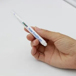 LEONIS Water Erasable Fabric Marking Pen Blue 5 Count Pack   78008   5 Count (Pack of 1) - hand holding leonis water erasable marking pen