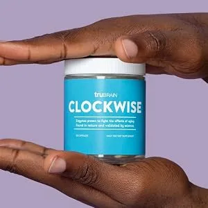 TruBrain Clockwise | Nicotinamide | NAD Booster | Increases Energy & Promotes Anti Aging | Cell Immunity - customer holding a Clockwise NAD Booster jar in between their two hands