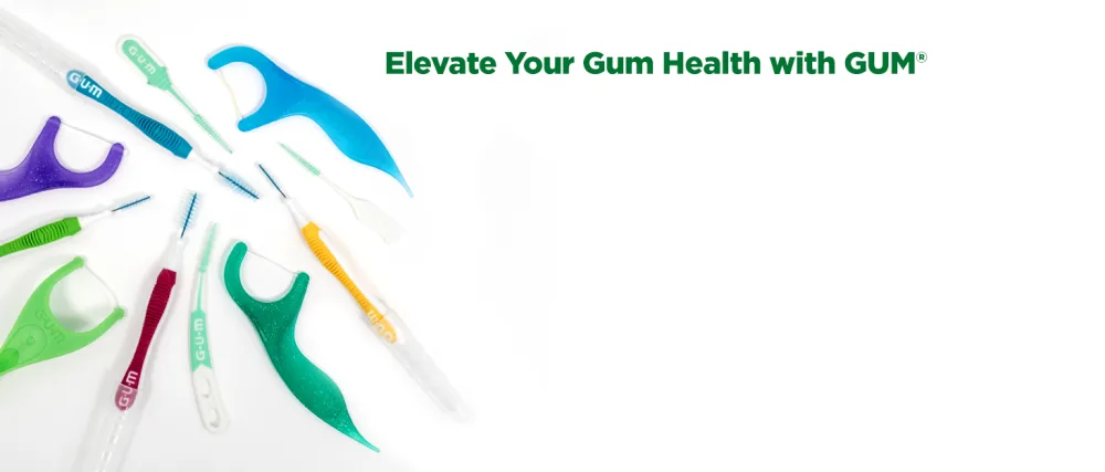 GUM - 202RK Crayola Timer Light Toothbrush (Single Toothbrush) Soft Bristle Packaging May Vary - Oral care instruments scattered on a white background