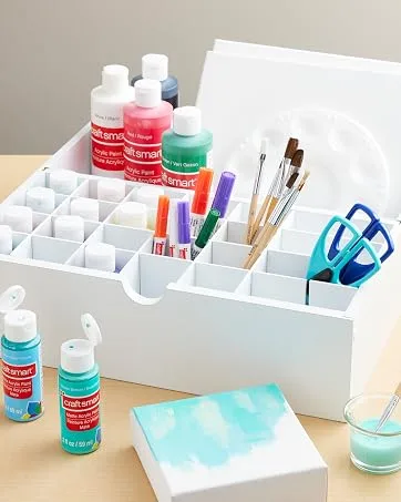 Michaels 12 x 12 Scrapbook Case by Simply Tidy  - A storage box with various paints and brushes