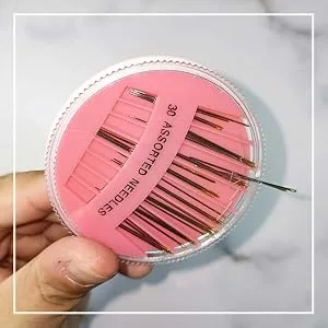 30 Pack Premium Hand Sewing Needles 6 Sizes Assorted Sewing Needles for Handsewing Large Eye Stitching Needles for Sewing Repair Embroidery Needles Sewing Sharp Needles (1) - Step 3. Shake the needles out of the gap