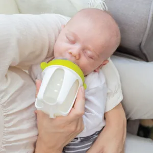 Kiinde Active Latch Silicone Baby Bottle Anti Colic Leak Proof Easy to Clean Includes 2 Medium Flow Active Latch Nipples with Covers 4 Ounce 2 Count Blue - baby drinking from silicone bottle