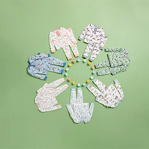 Mud Pie Children's Grandma Cuddler Teether - A circle showing the different styles of childrens pjs