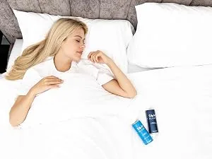 Som Sleep Ultimate Nighttime Set Sleep Mask & Functional Sleep Beverage Zero Sugar - 24-Pack - women in bed with som sleep cans