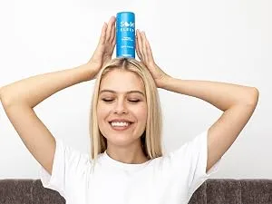 Som Sleep Ultimate Nighttime Set Sleep Mask & Functional Sleep Beverage Zero Sugar - 24-Pack - women with som sleep can on bed