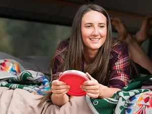 HYDAWAY Collapsible Bowl Set | 2-Pack | Glacier Blue - Woman holding a HYDAWAY Collapsible Bowl in a campervan
