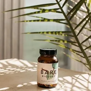 Bare Biology Mindful Omega 3 Fish Oil Capsules - Support for Brain Function and Eyes - Super Strength / Made from Sustainably Caught Fish (30 Capsules) - Bare Biology - Vim & Vigour, Vegan Omega 3 capsules, bottle and box next to a kitchen sink