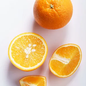 Absolute Aromas Daybreak Aroma-Roll Roller Ball - Contains 100% Pure Natural Lemon Orange and Ylang Ylang Essential Oil - Oranges cut in half