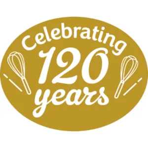 Carnation Drizzle Chocolate 450g - Carnation history