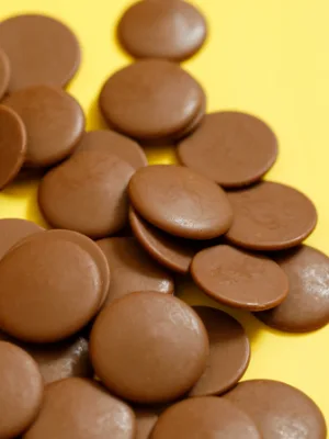 Montezuma's Giant Creamy White Chocolate Buttons Deliciously Gluten Free & Organic 180g Bag - Product Image