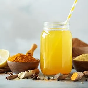 Turmeric Ginger Spiced Immunity BoostingTea | 100g (50 servings) | Herbal Detox blend of 9 Super spices| Caffeine Free - latte 2