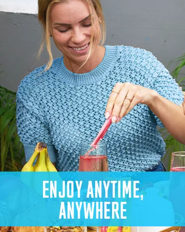 Key Nutrients Multivitamin Electrolytes BCAA Powder - Post Workout - 30 Servings - image of smiling woman preparing electrolyte drink