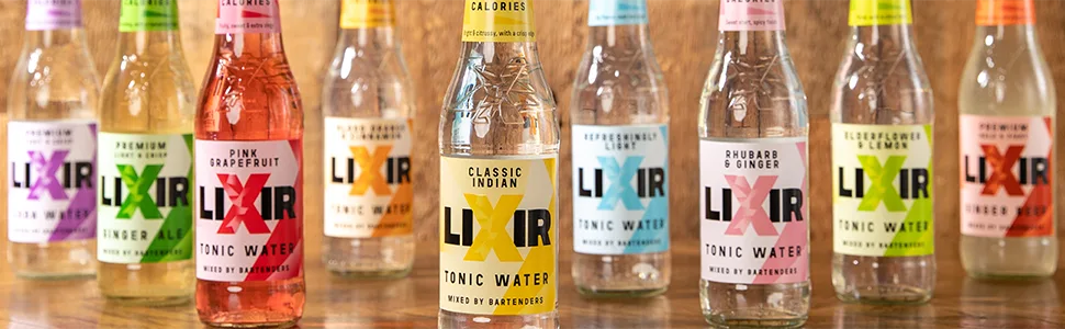 Lixir Premium Soda Water Premium Mixer 24 x 200ml Recyclable Glass Bottles - selection of lixir bottles in front of wood panelled wall