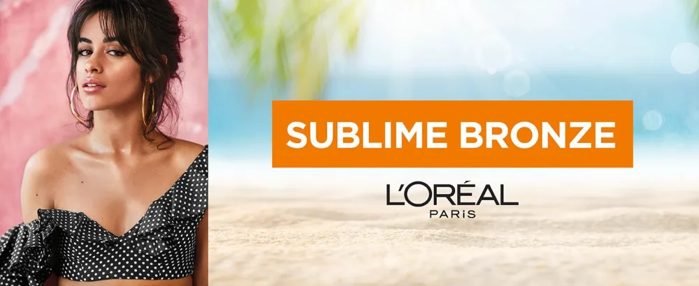 L'Oreal Skincare Sublime Bronze Hydrating Self-Tanning Water Mousse Quick-Drying - Medium - 5 fl. Oz - Model wearing Sublime Bronze Self-Tanning Mousse